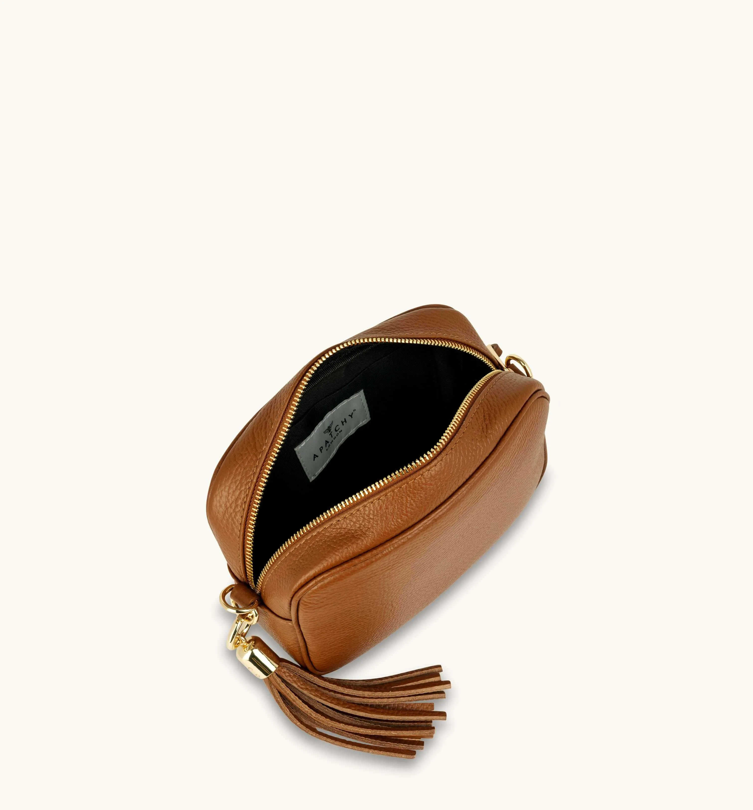 The Tassel Tan Leather Crossbody Bag With Tan Cheetah Strap
