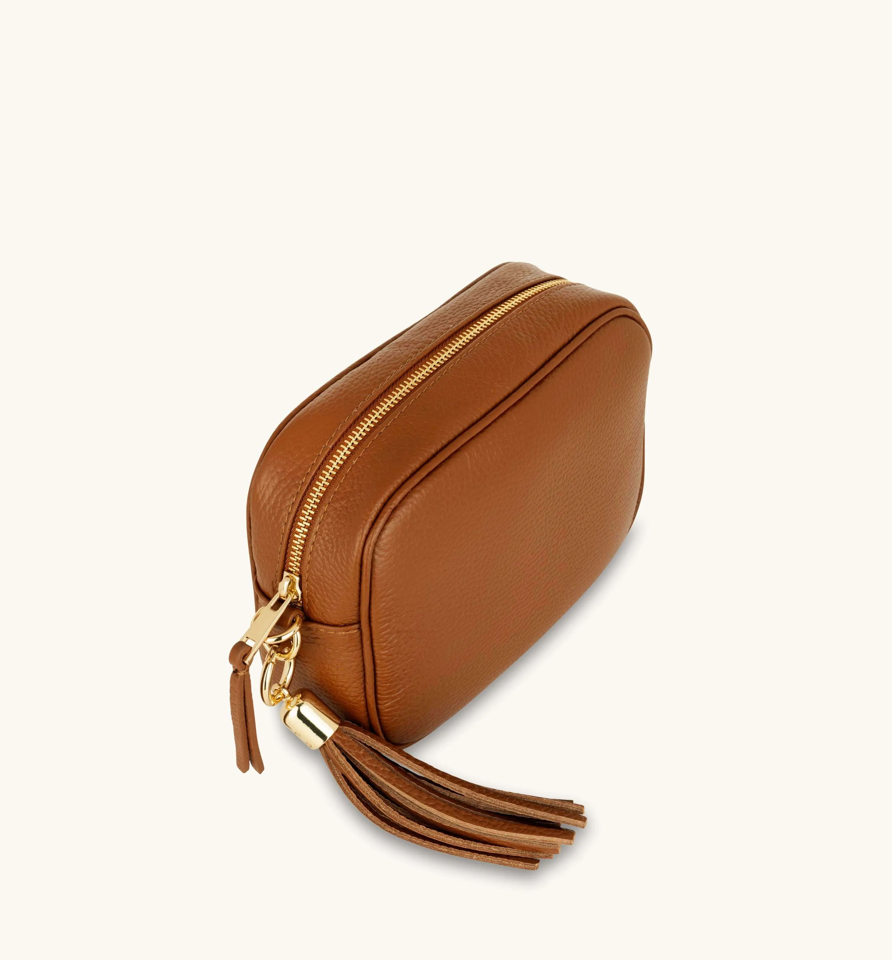 The Tassel Tan Leather Crossbody Bag With Tan Cheetah Strap