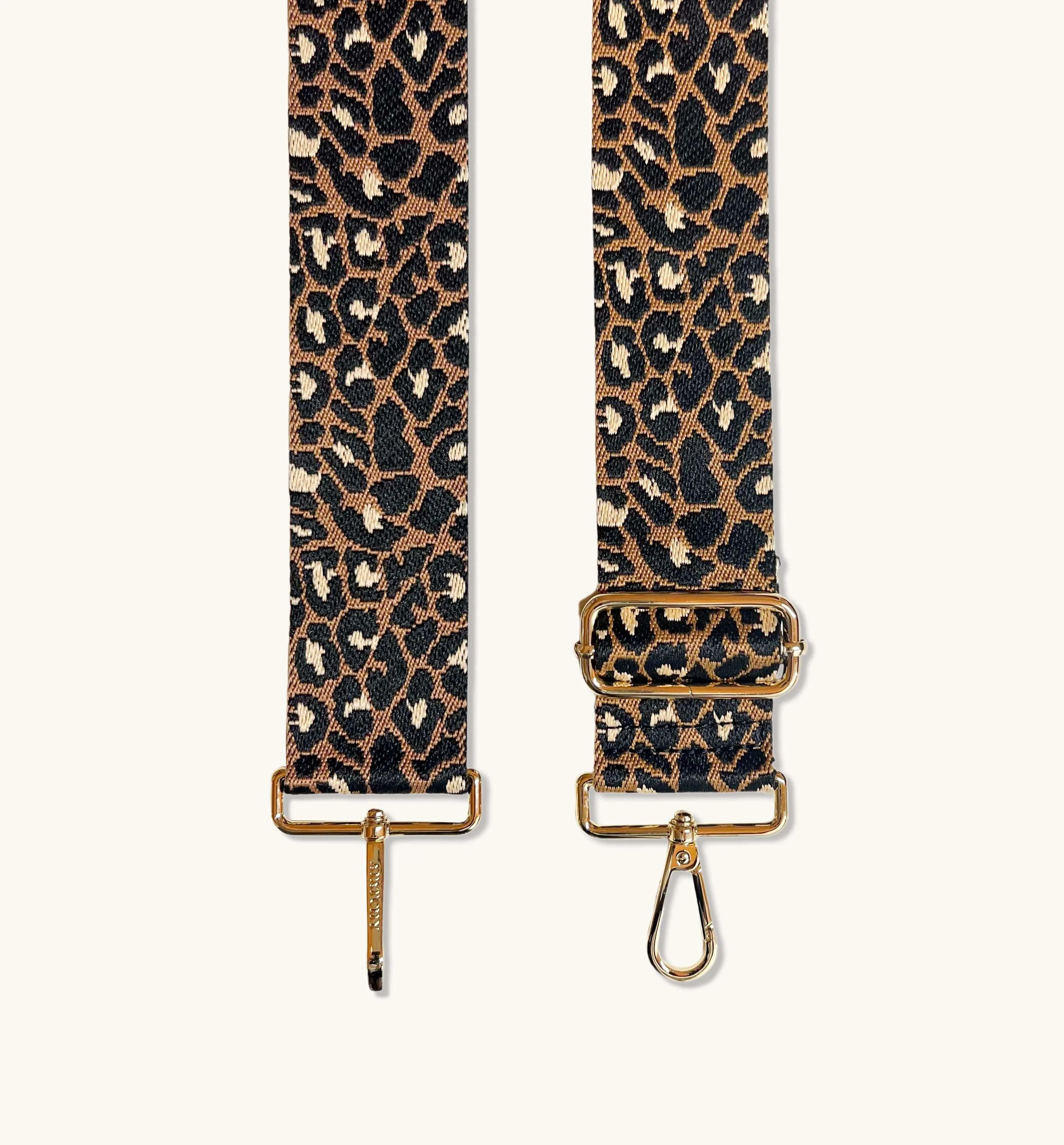 The Tassel Tan Leather Crossbody Bag With Tan Cheetah Strap