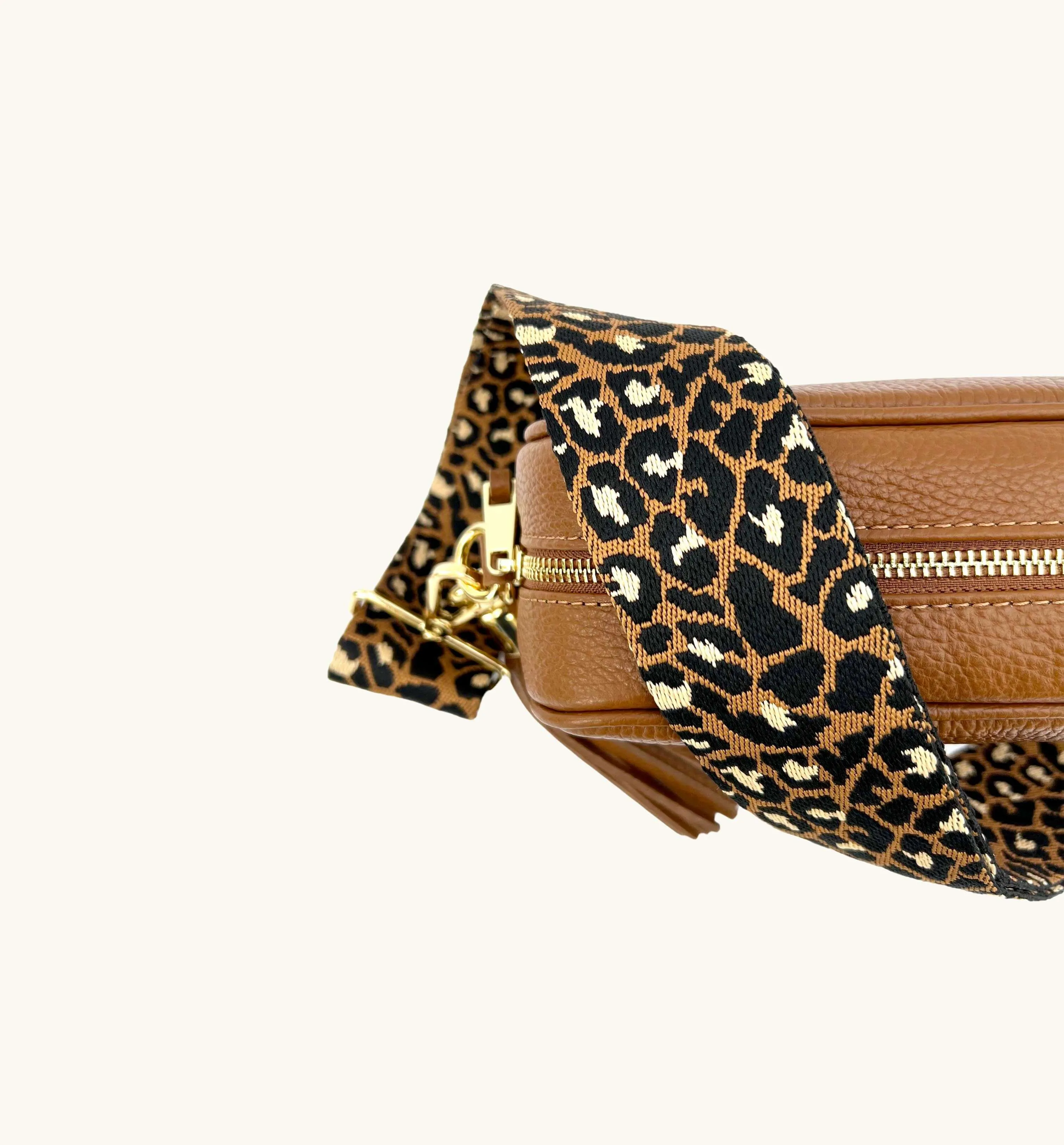 The Tassel Tan Leather Crossbody Bag With Tan Cheetah Strap